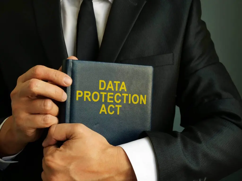 Lawyer is holding Data Protection Act book